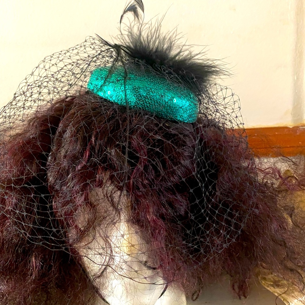 Fascinator by atmosphere I have 2 green & purple